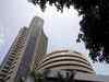 Sensex ends day in green, L&T, RIL surge 3%; Sun Pharma crashes 9%