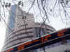 Markets slip in red as RBI disappoints