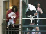 Jackson's kids emerge from behind the veil