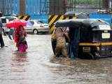 Commuters stranded on flooded streets in Mumbai