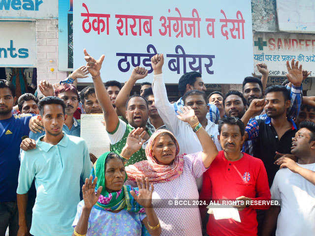 People protest against a liquor vend in Chandigarh