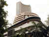 Market opens lower; Sensex down 98 pts