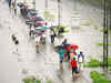 Rains halt Mumbai, commuters hit hard as local trains cancelled
