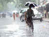 Mumbai rains: Office-goers cycle to work as trains halt following heavy downpour