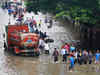 Rains halt Mumbai, 2 killed, rail commuters hit hard