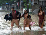 School children on a water-logged street