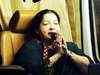 Jayalalithaa's followers shower petals on her way to public address