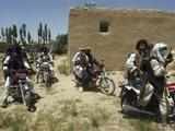 Taliban fighters on motorbikes