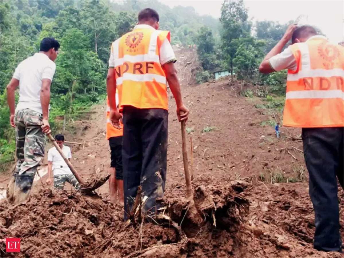 Villagers try to clean roads - Heavy rains trigger landslides in West ...