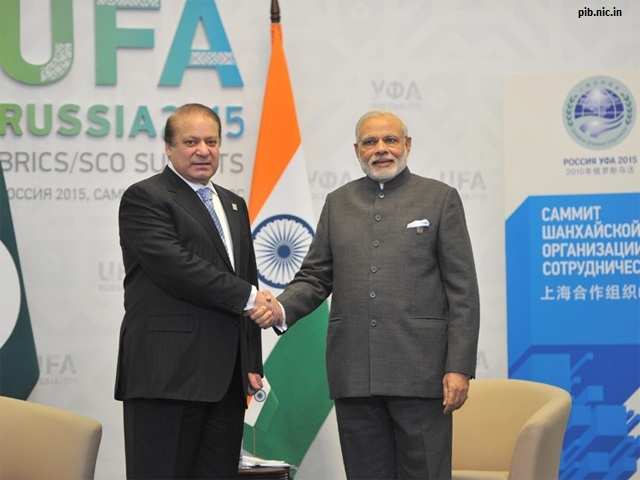 PM Modi shake hands with Pakistan PM Nawaz Sharif