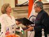 Hillary, S M Krishna sign defence agreements