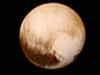 NASA's New Horizons spacecraft captures mysterious dark spots on Pluto