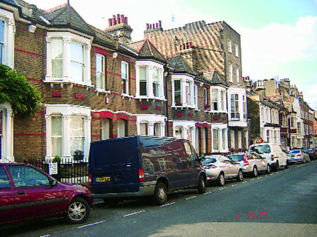 Rowhouses with slanted roods and chimneys