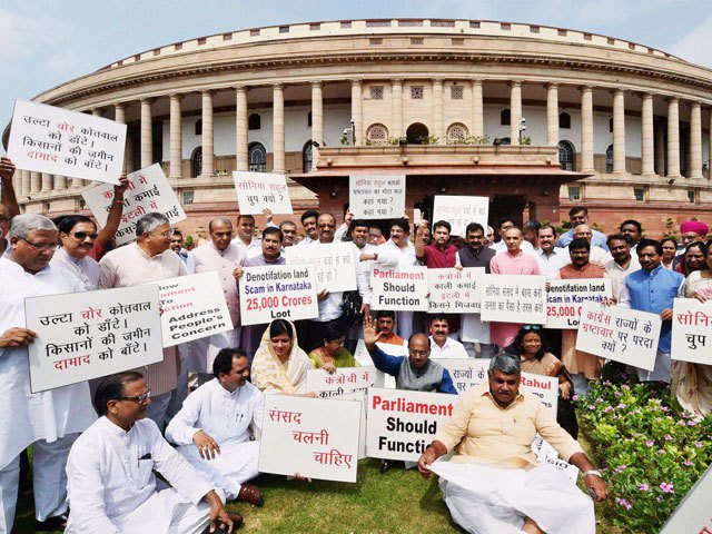 BJP MPs hold placards during a protest