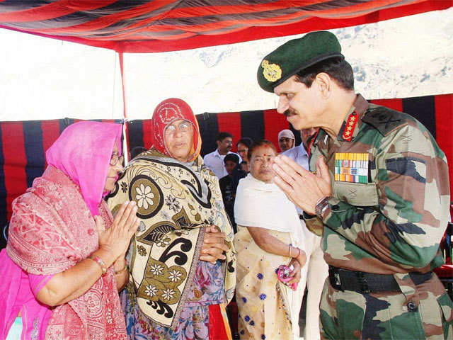 Army Chief felicitating martyrs' families