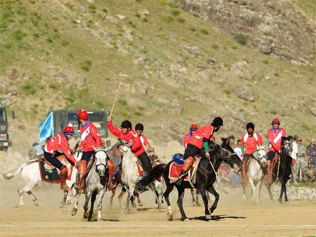 Polo players in action at the Drass
