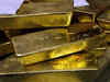 Gold stays near 5.5 year low; outlook by experts