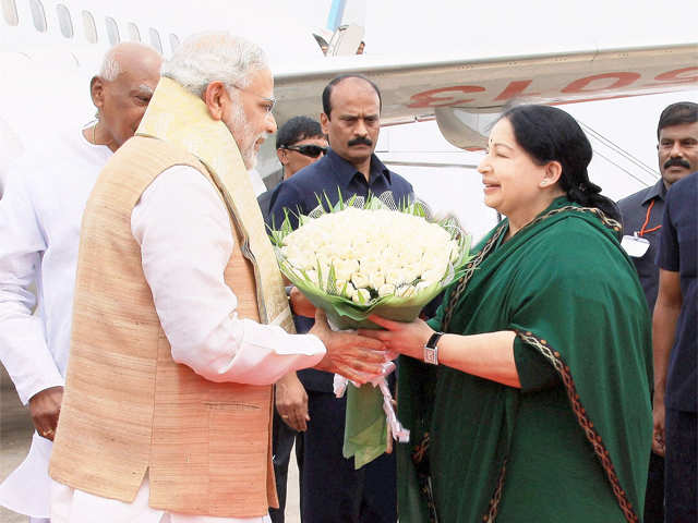 PM Modi is greeted by Jayalalithaa at the airport