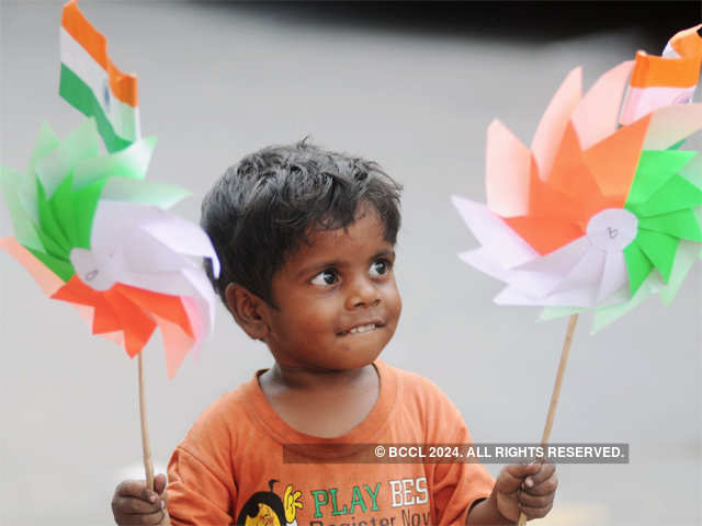 Boy carries tricolour