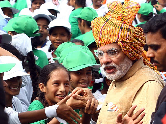 PM Modi shake hands with children