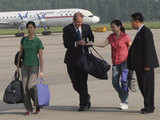 Journalists arrive at an airport