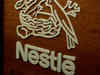 Nestle defies market rout, but fails to sustain early gains
