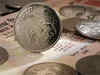 Rupee gains, opens at 66.41 against US Dollar