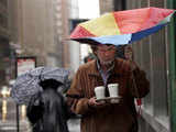 A man carries an umbrella