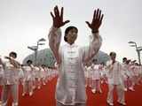 People perform Taichi