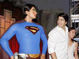 Brandon Routh, with girlfriend poses with his wax figure