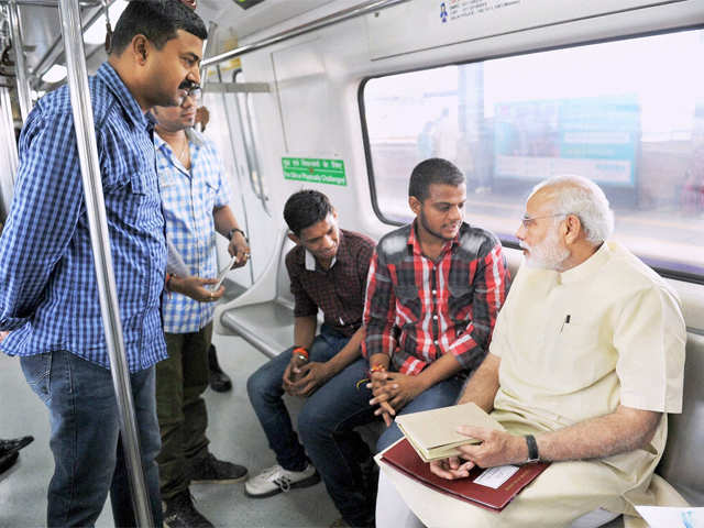 PM interacts with passengers
