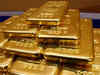 Gold edges up after 4-day losing streak as dollar retreats