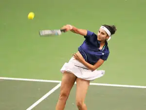 Paes and Sania stormed into the finals of the US Open mixed Doubles and women's doubles draw respectively with common partner Martina Hingis.
Paes and Sania stormed into the finals of the US Open mixed Doubles and women's doubles draw respectively with common partner Martina Hingis.