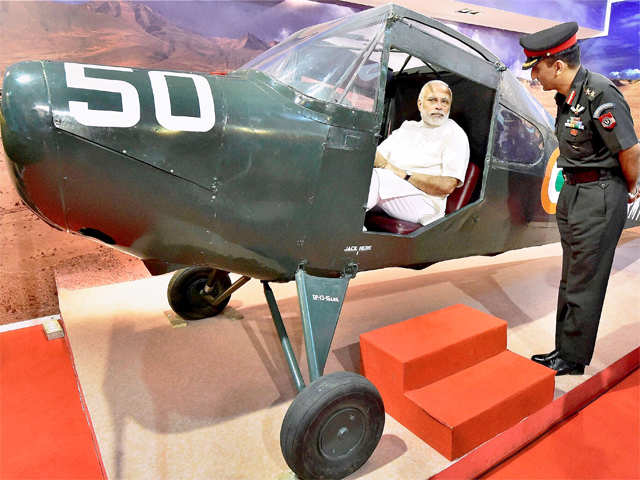PM Modi poses with a plane