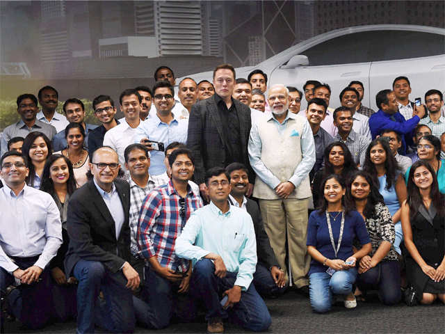PM Modi and Elon Reeve Musk with Tesla's employees
