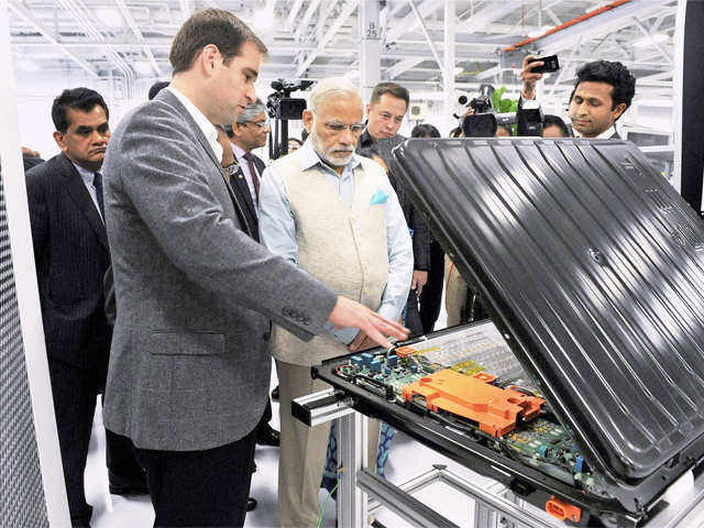 PM Modi during a visit of TESLA motors facility