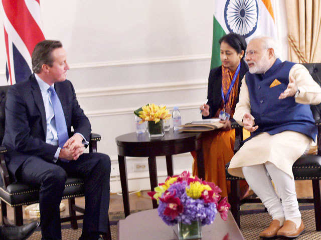 With British Prime Minister David Cameron