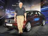 CEO Mercedes-Benz India poses with new launch