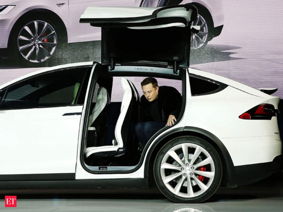 Elon Musk Delivers Tesla S First Model X Electric Suvs The Economic Times