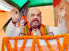 Nitish Kumar can't develop Bihar by carrying Lalu Prasad, Congress: Amit Shah