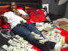 50 Cent shows his cash online in response to bankruptcy jibes