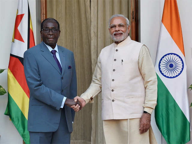 PM with Robert Mugabe