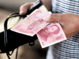 China ups rate for yuan by largest amount in a decade