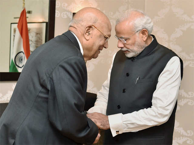 PM Modi commiserating with Industrialist Lord Swraj Paul