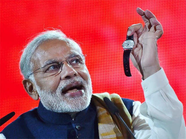 Prime Minister Narendra Modi showing his watch