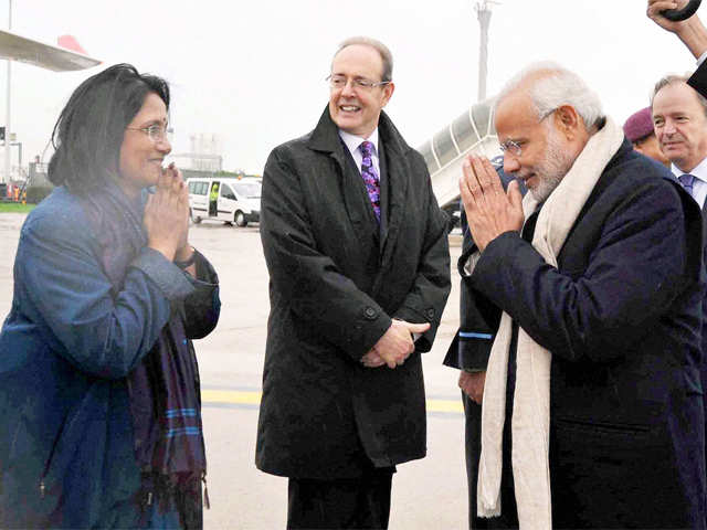 PM Modi is seen off by officials at London Airport