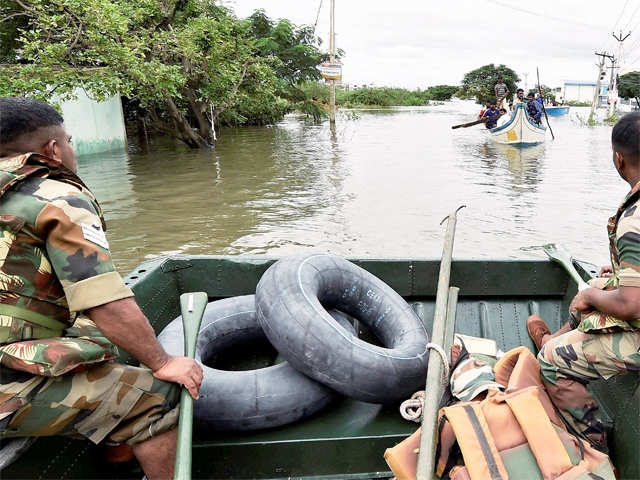 Flood relief operations in rain-hit areas of Mudichur