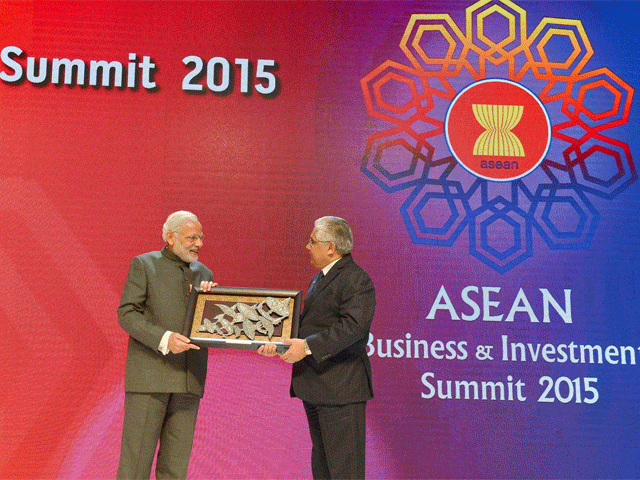 Prime Minister Narendra Modi receiving a memento