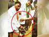 Former minister holds slippers for Rahul Gandhi