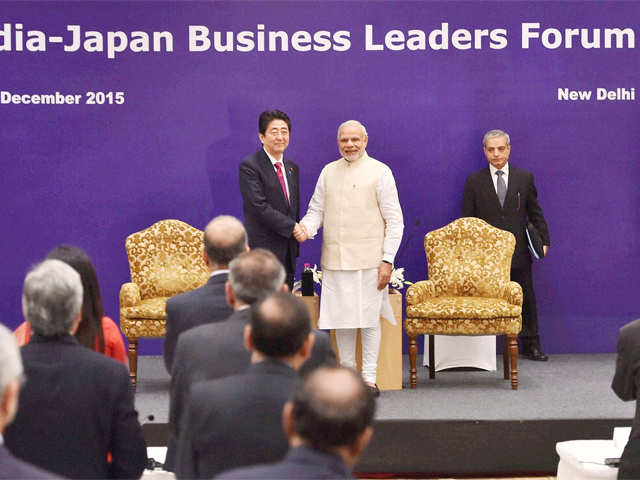 PM Modi shakes hands with his Japanese counterpart